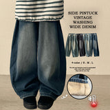 Leg hem snap side pin tuck denim wide pants