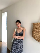 Slit shirring flower long sleeveless dress