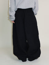 Kuro banding snap pocket wide fit washed pants