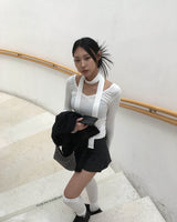 Low check button skirt