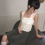 Cosh punching see-through ribbon sleeveless blouse