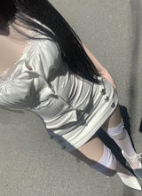 Trony button low-waist skirt (white)