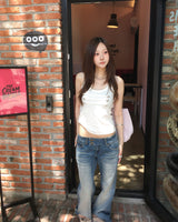 ダブルボタンローライズデニムパンツ