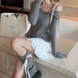 Uncut strap ribbed long-sleeved top