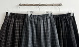 Bomi A-line pleated check midi skirt 