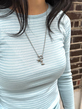 Bold boots and star necklace