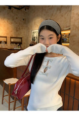 silver bow open ribbed long-sleeved knitwear