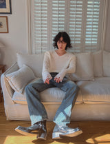Reverse damage V-neck knitwear