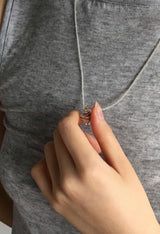Matt conch symbol long necklace