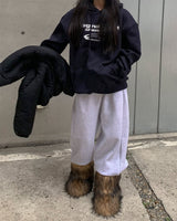 Bear fur boots