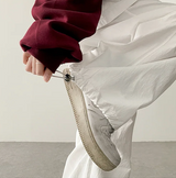 Log banding layered pocket skirt pants