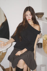 Chic black unbalanced off-shoulder knitwear