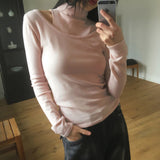 Lume unbalanced shoulder slit turtleneck knitwear
