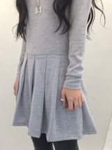 line and pleated dress