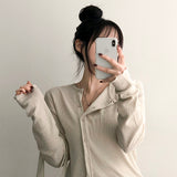 Shade Punching Pattern Snap Eyelet Cardigan