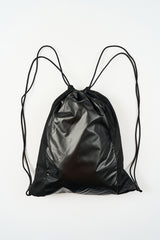Metallic panel drawstring backpack