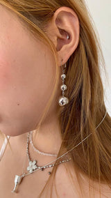 Three silver balls drop earrings