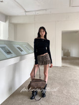 Black hole off-shoulder long-sleeved knitwear