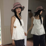 Semble hole string sleeveless blouse