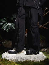 24AW クリサリスコクーンブレーキングマルチジップシームディコンスパンチロングパンツ
