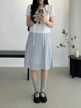 Sovy check flare midi skirt