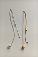 Matt conch symbol long necklace