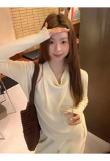 Flower brooch striped long-sleeved knit shirt