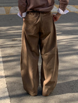 Frange Over Curved Pants