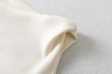 Daphne Asymmetric Ribbon Top