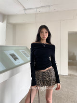 Black hole off-shoulder long-sleeved knitwear