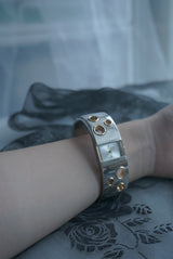 gold hole bangle watch