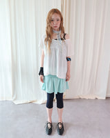 RIPPLE FOLDING SKIRT