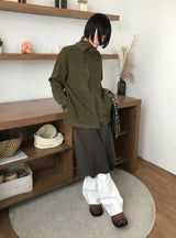 DIAGONAL HIGH-NECK ZIP-UP