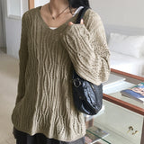 Seomit punching two-way eyelet back strap V-neck overfit long sleeve knit
