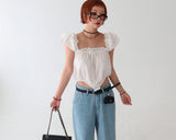 Light blue polka dots and wide pants