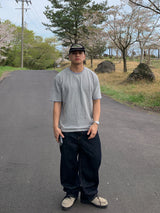 Back-banding raw denim pants