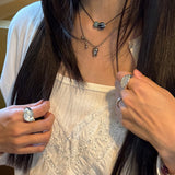 tooth piercing necklace