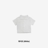 an ethine ringle shirt