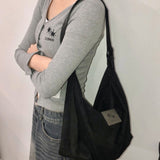 NAIF SUEDE SHOULDER BAG