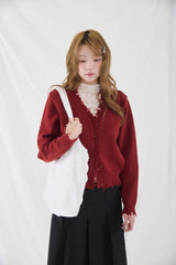 Rough damaged cardigan