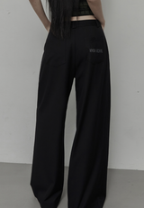 [mnem] Folded Emblem Slacks