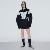 Wrap-front pleated mini skirt
