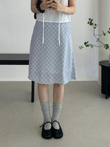 Sovy check flare midi skirt