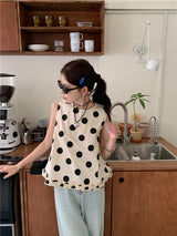 dotted sleeveless blouse