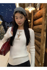 silver bow open ribbed long-sleeved knitwear