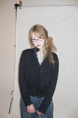 Rough damaged cardigan
