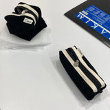 Clam round pencilcase _ Corduroy black