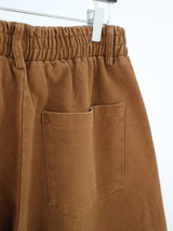 Kuro banding snap pocket wide fit washed pants