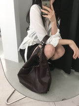 eyelet shoulder bag