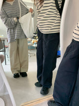 a light striped sweatshirt, grey
